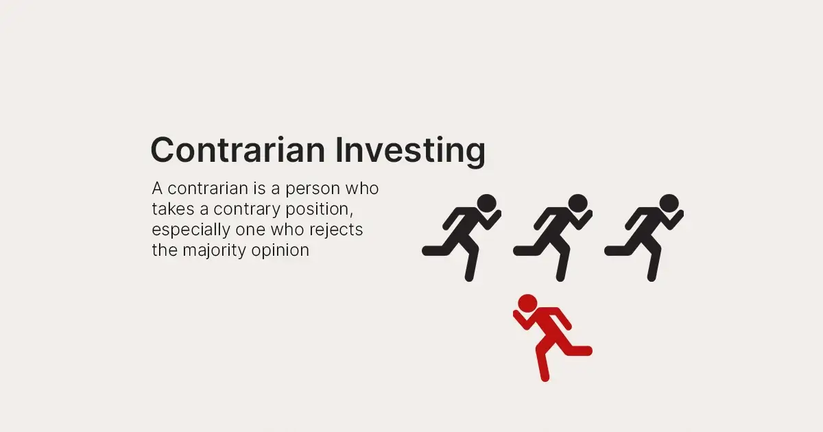 Four stick figures on a white background, with three of them walking towards the right and one walking towards the left. The text "contrarian investing" is displayed above the stick figures in black font. This image represents the concept of going against the majority or conventional wisdom in investing.